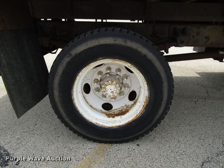 image for item DG1320 2003 GMC C7500 flat dump bed truck