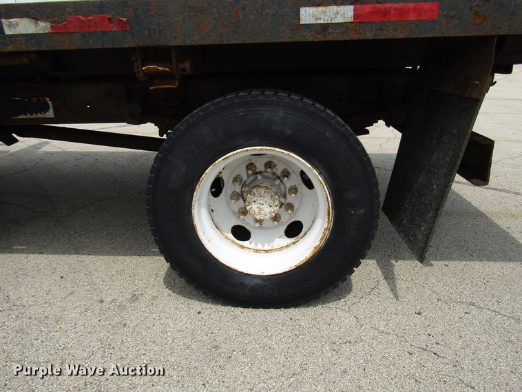 image for item DG1320 2003 GMC C7500 flat dump bed truck