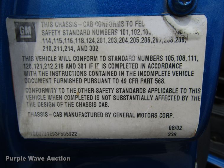 image for item DG1320 2003 GMC C7500 flat dump bed truck