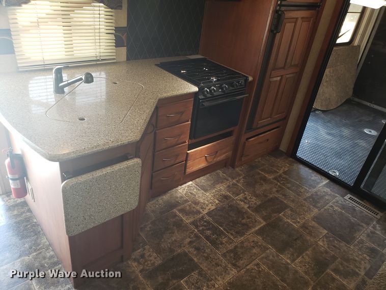 image for item FL9065 2012 Heartland Cyclone toy hauler camper