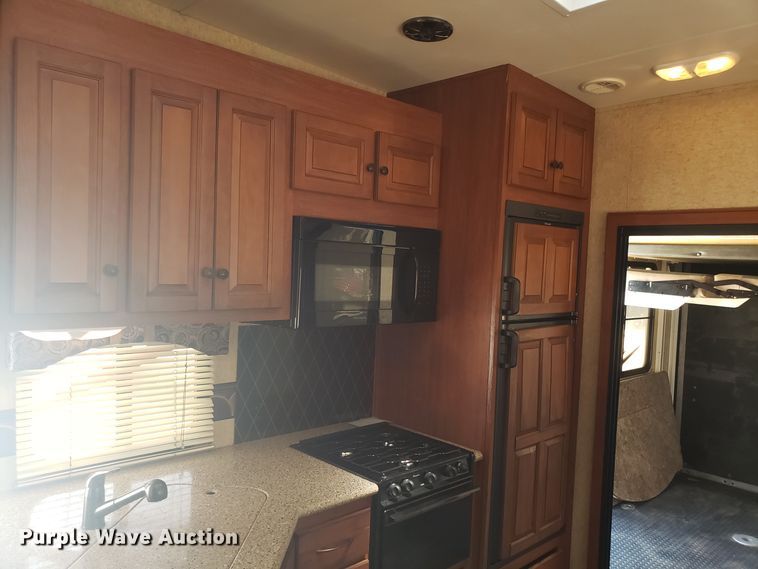 image for item FL9065 2012 Heartland Cyclone toy hauler camper