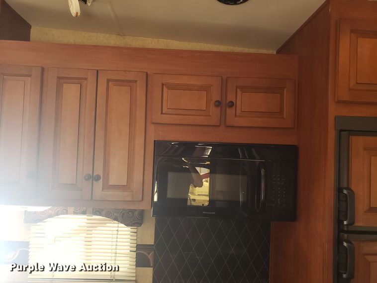 image for item FL9065 2012 Heartland Cyclone toy hauler camper