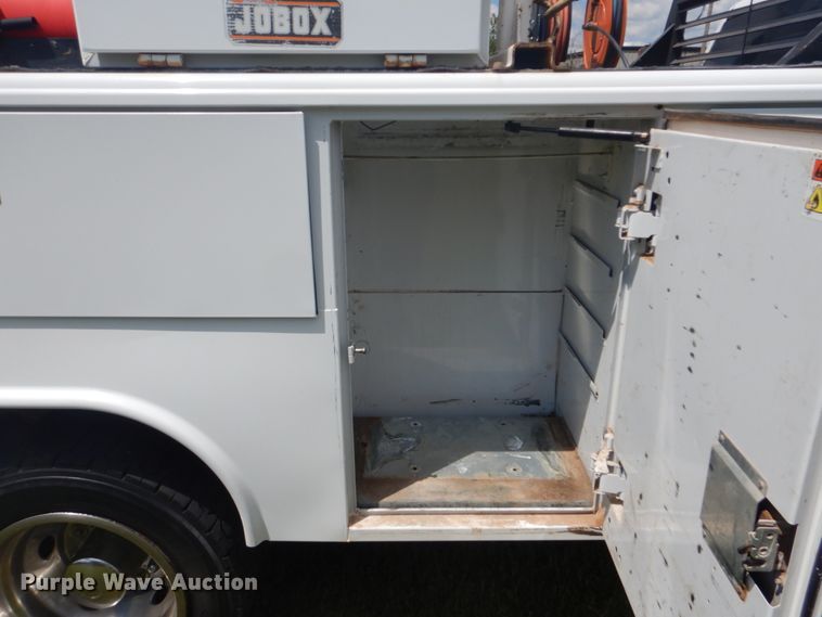 image for item FT9358 2013 Dodge Ram 5500 Crew Cab service truck with crane