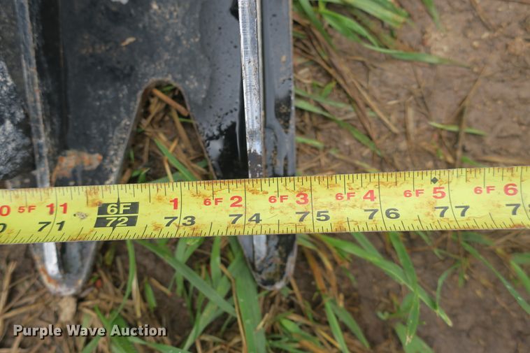 image for item EA9327 75"W skid steer grapple bucket