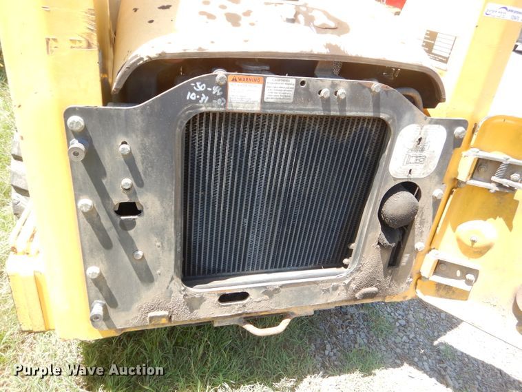 image for item ED9470 2003 Komatsu SK815 skid steer