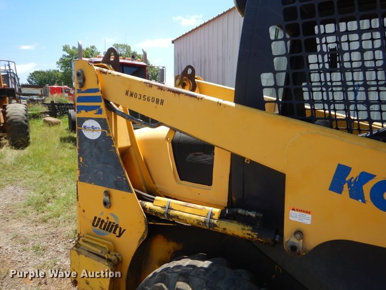image for item ED9470 2003 Komatsu SK815 skid steer