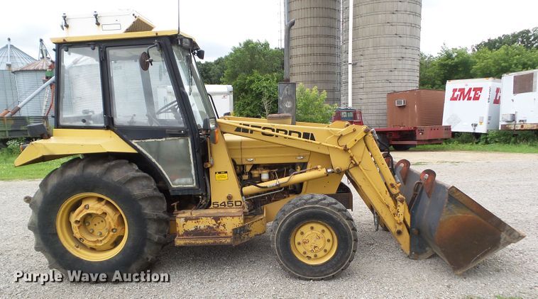 image for item EM9780 1997 Ford 545A MFWD tractor