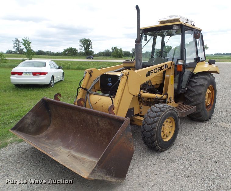 image for item EM9780 1997 Ford 545A MFWD tractor