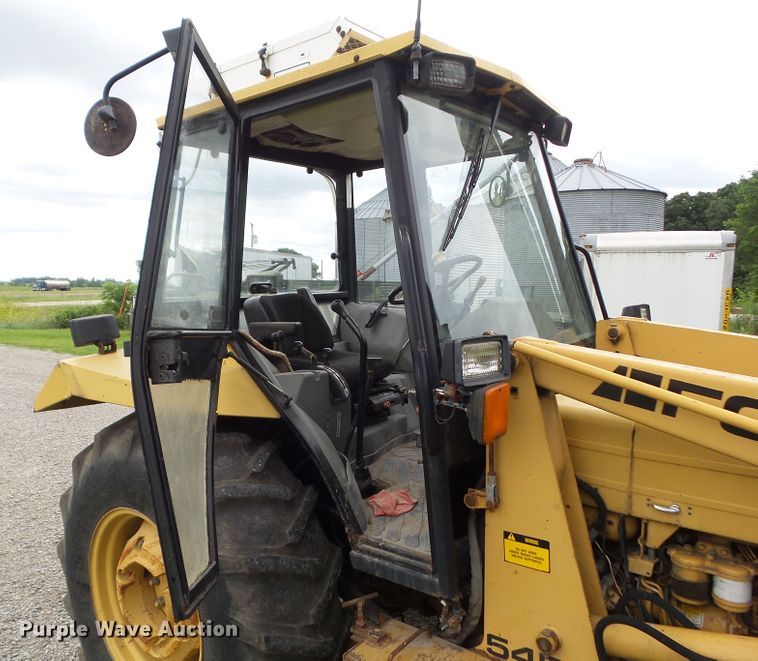 image for item EM9780 1997 Ford 545A MFWD tractor