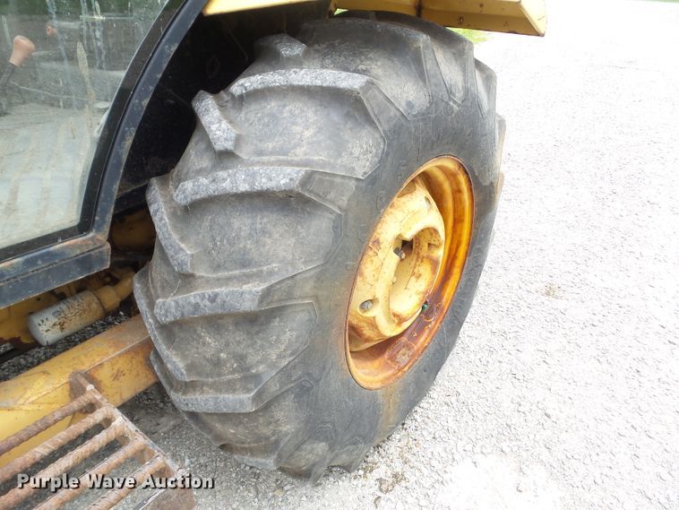 image for item EM9780 1997 Ford 545A MFWD tractor