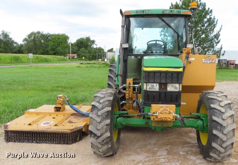 image for item DD6313 2000 John Deere 6310 MFWD tractor