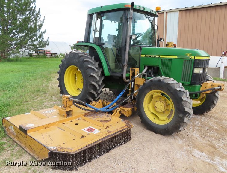 image for item DD6313 2000 John Deere 6310 MFWD tractor