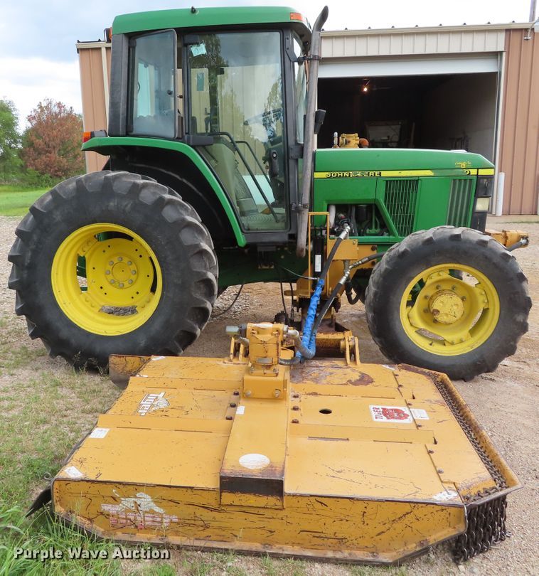 image for item DD6313 2000 John Deere 6310 MFWD tractor