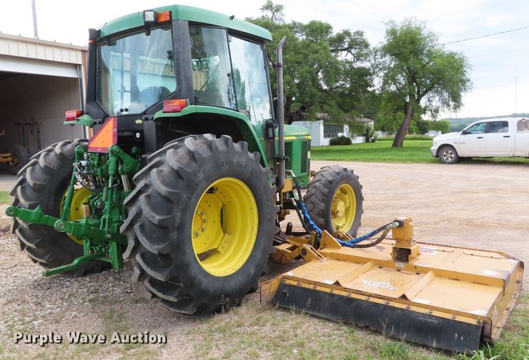 image for item DD6313 2000 John Deere 6310 MFWD tractor