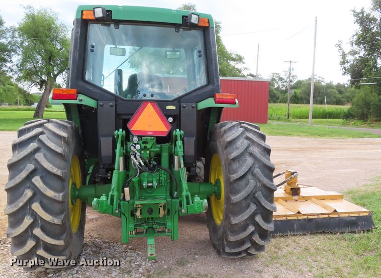 image for item DD6313 2000 John Deere 6310 MFWD tractor