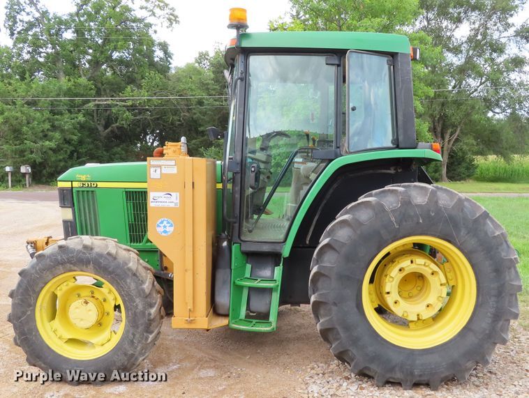image for item DD6313 2000 John Deere 6310 MFWD tractor