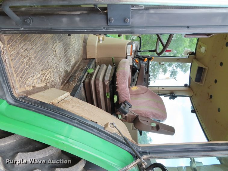 image for item DD6313 2000 John Deere 6310 MFWD tractor