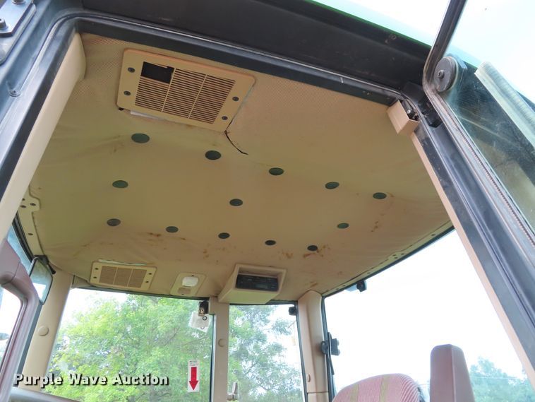 image for item DD6313 2000 John Deere 6310 MFWD tractor