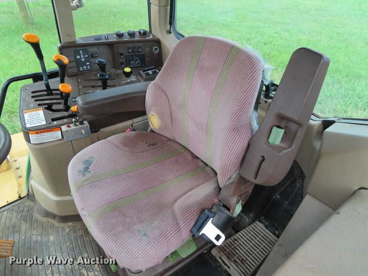 image for item DD6313 2000 John Deere 6310 MFWD tractor