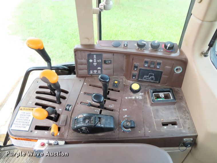 image for item DD6313 2000 John Deere 6310 MFWD tractor