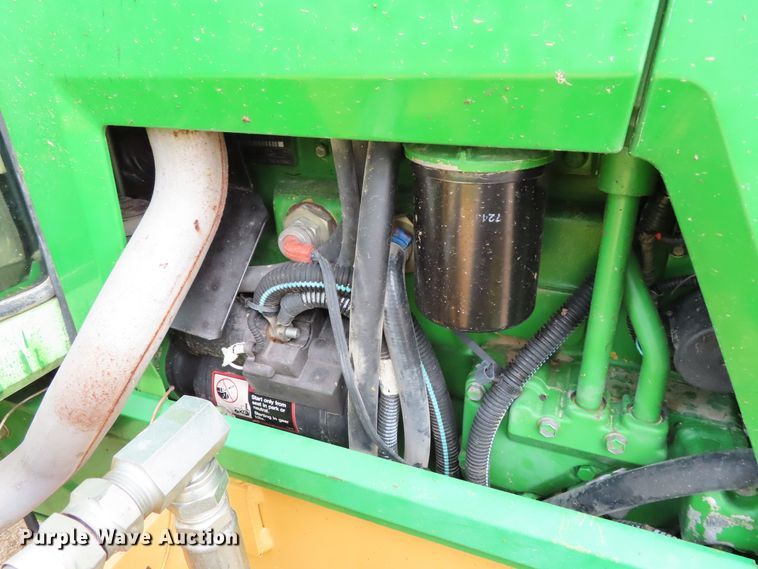 image for item DD6313 2000 John Deere 6310 MFWD tractor
