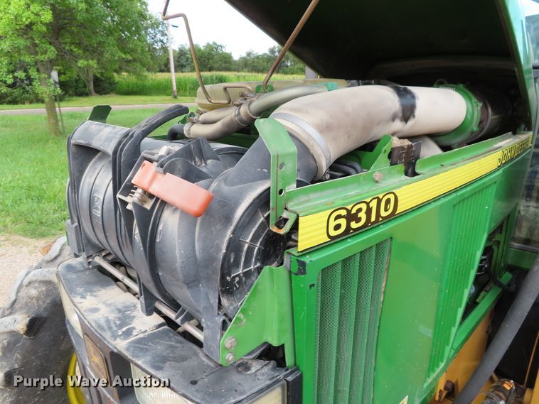 image for item DD6313 2000 John Deere 6310 MFWD tractor
