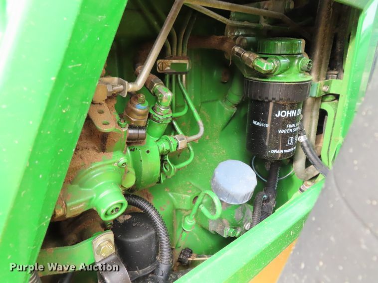 image for item DD6313 2000 John Deere 6310 MFWD tractor