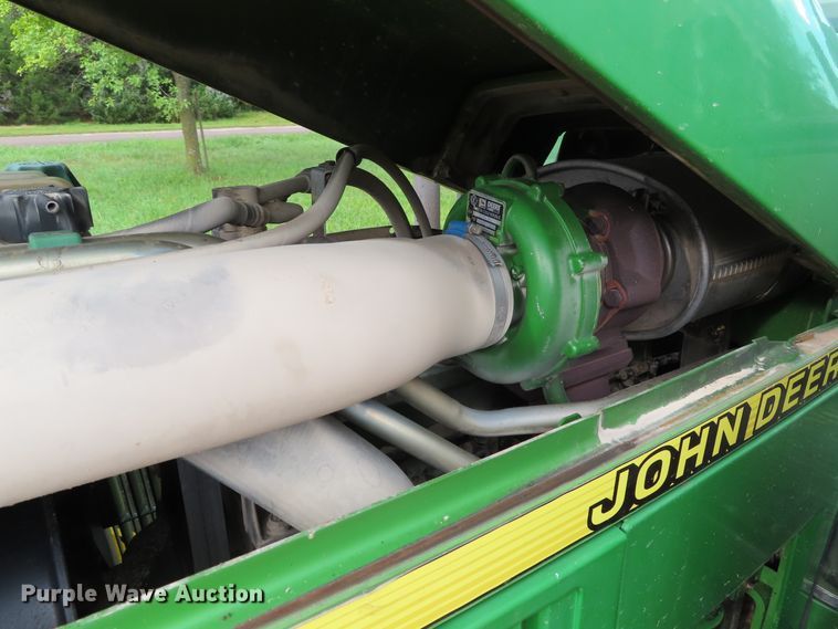 image for item DD6313 2000 John Deere 6310 MFWD tractor