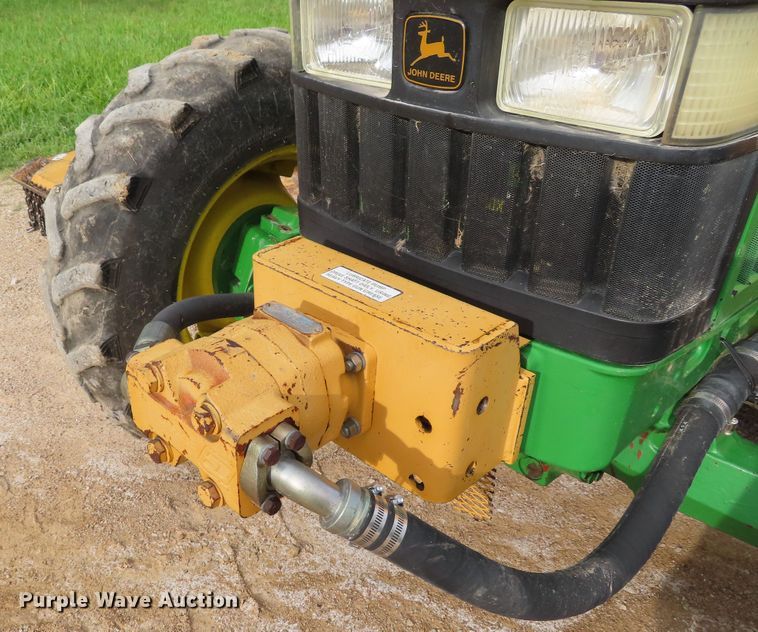 image for item DD6313 2000 John Deere 6310 MFWD tractor