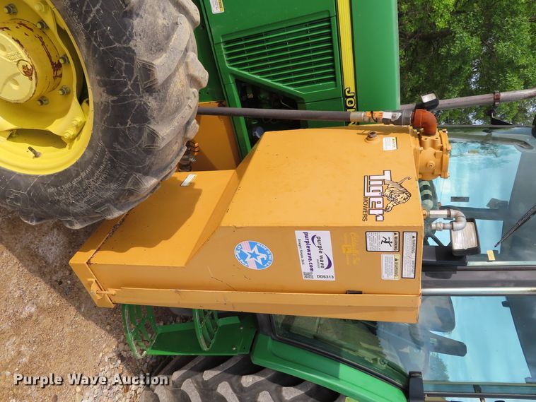 image for item DD6313 2000 John Deere 6310 MFWD tractor