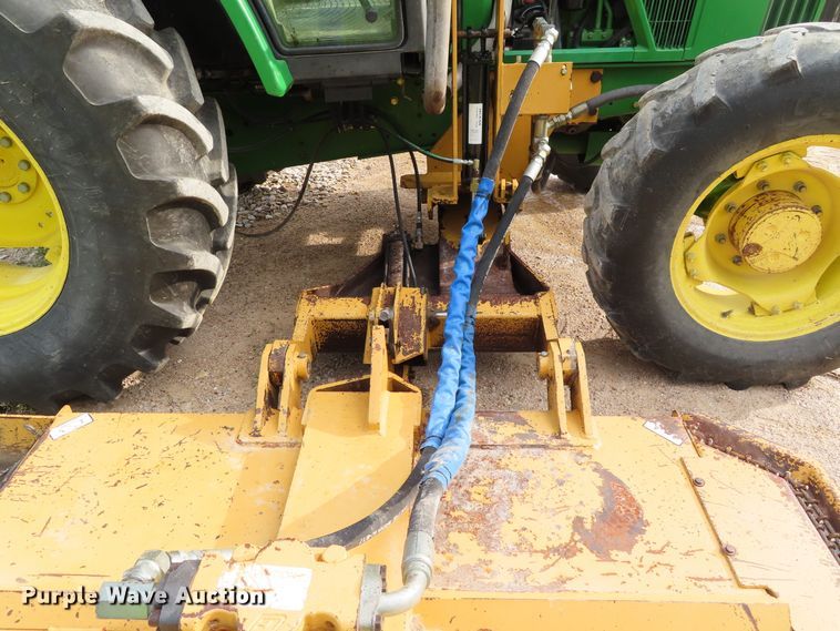 image for item DD6313 2000 John Deere 6310 MFWD tractor