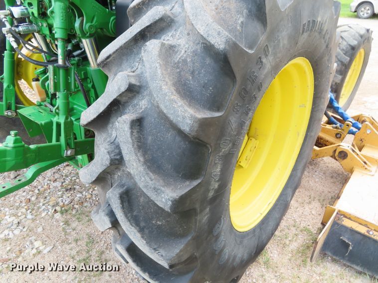 image for item DD6313 2000 John Deere 6310 MFWD tractor