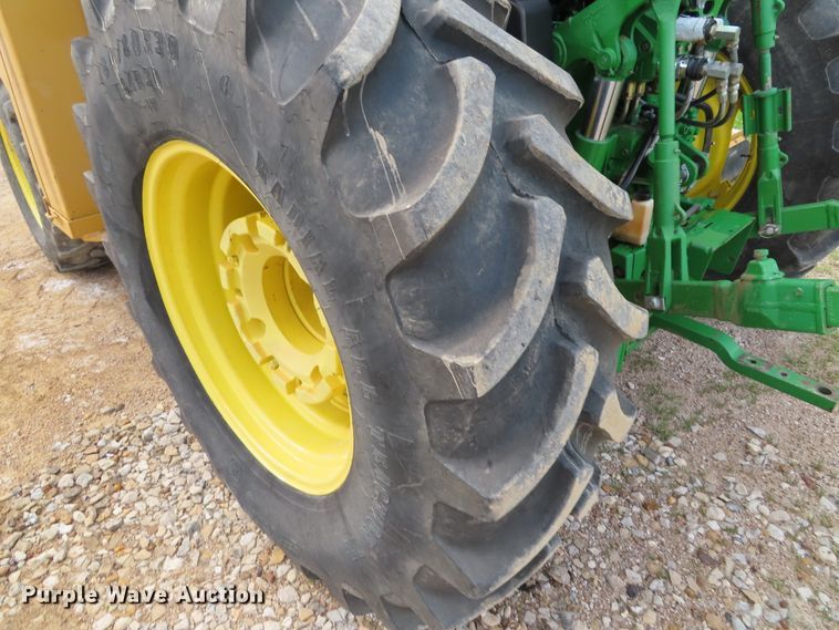image for item DD6313 2000 John Deere 6310 MFWD tractor