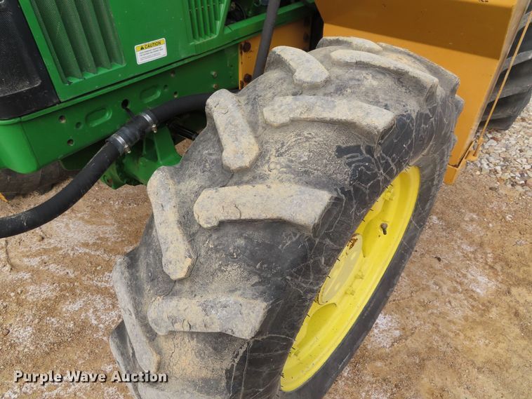 image for item DD6313 2000 John Deere 6310 MFWD tractor