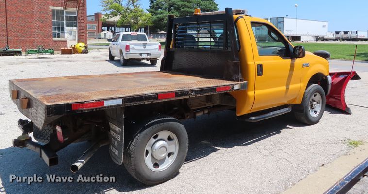 image for item DD6345 2006 Ford F350 Super Duty flatbed pickup truck