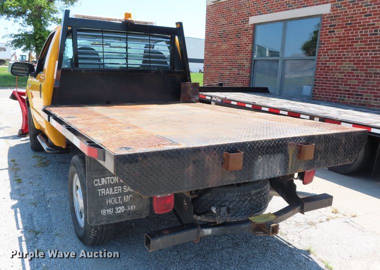 image for item DD6345 2006 Ford F350 Super Duty flatbed pickup truck