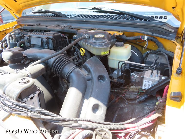 image for item DD6345 2006 Ford F350 Super Duty flatbed pickup truck