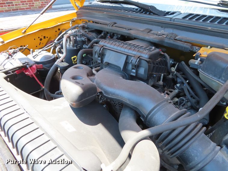 image for item DD6345 2006 Ford F350 Super Duty flatbed pickup truck