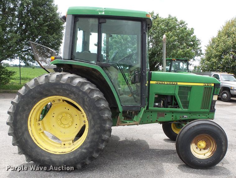 image for item DE7876 2001 John Deere 6410 tractor