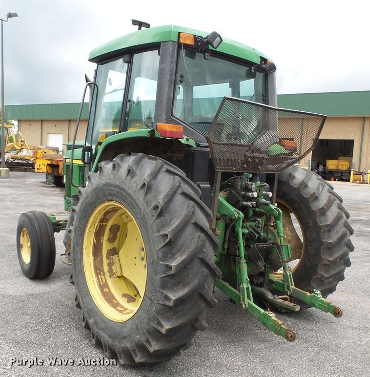 image for item DE7876 2001 John Deere 6410 tractor