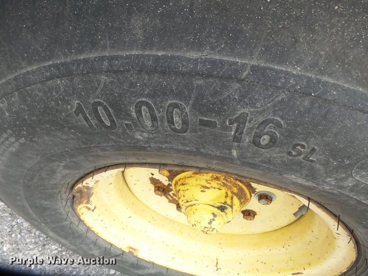 image for item DE7876 2001 John Deere 6410 tractor