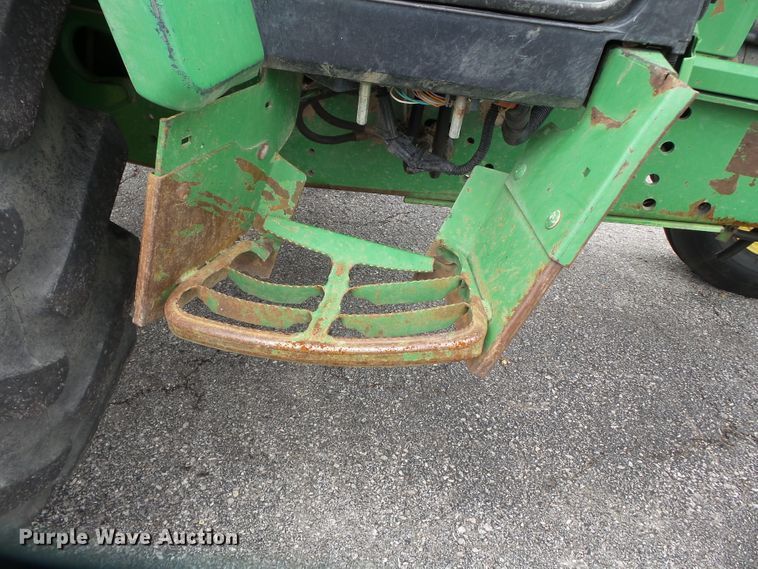 image for item DE7876 2001 John Deere 6410 tractor