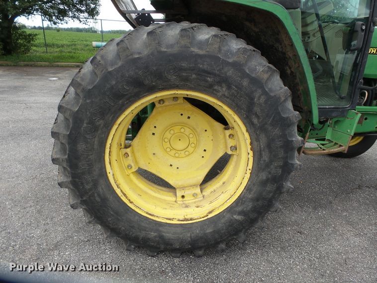 image for item DE7876 2001 John Deere 6410 tractor