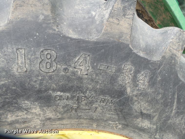 image for item DE7876 2001 John Deere 6410 tractor