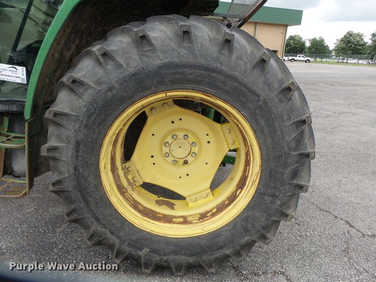 image for item DE7876 2001 John Deere 6410 tractor