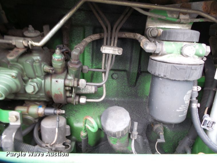 image for item DE7876 2001 John Deere 6410 tractor