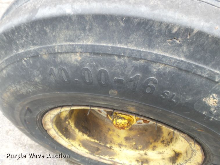 image for item DE7879 2001 John Deere 6410 tractor