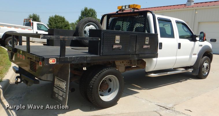 image for item DG4822 2005 Ford F550 Super Duty Crew Cab flatbed truck