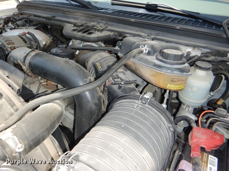 image for item DG4822 2005 Ford F550 Super Duty Crew Cab flatbed truck