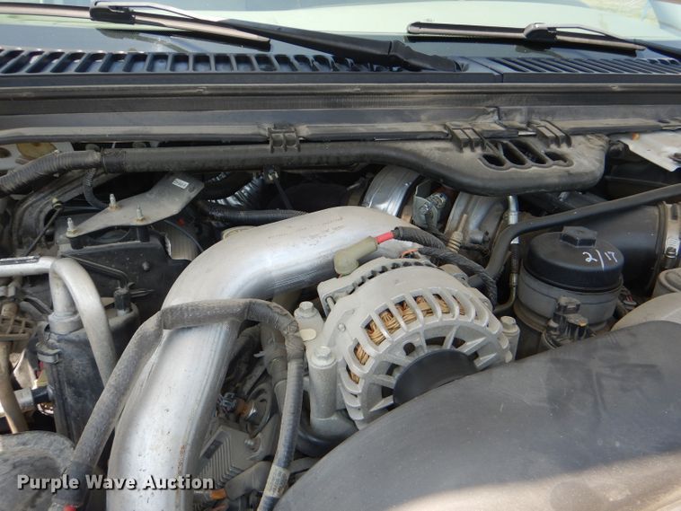 image for item DG4822 2005 Ford F550 Super Duty Crew Cab flatbed truck